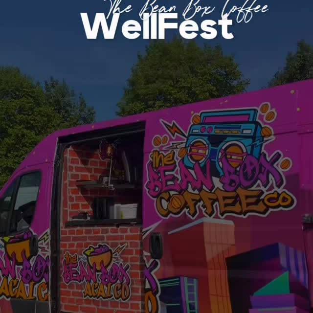 The Bean Box pink mobile van at WellFest 2026 with the boombox logo